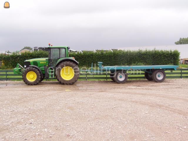 John Deere 6620 met Platte kar