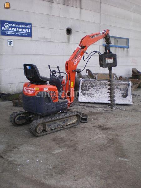 Minigraver met grondboor