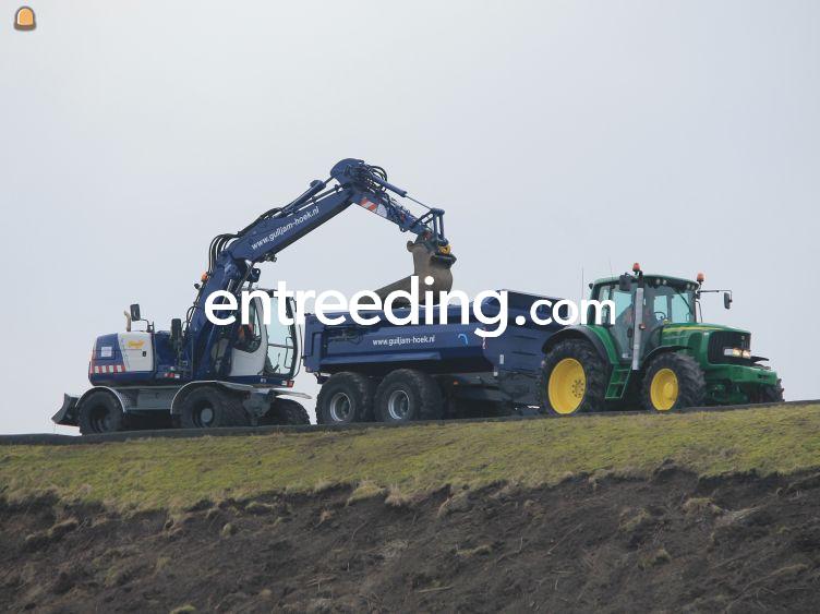 Trekker met gronddumper