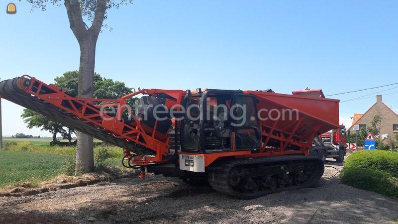 Rupsdumper met transportbandsysteem