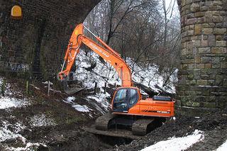 Doosan DX255LC   27 Ton Omgeving Grave