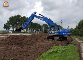 Kobelco SK210-10 met GPS ... Omgeving Maarssen