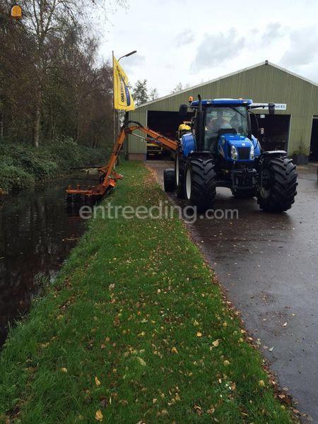 New holland tm120 + hemos slootapparaat