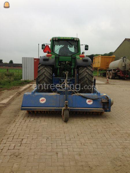 Tractor + veegmachine