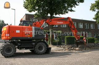 Hitachi ZX 140 Omgeving Voorne-Putten