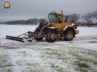 shovel met sneeuwschuiver Omgeving Amsterdam