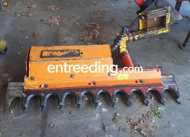 Takkenschaar aan arm