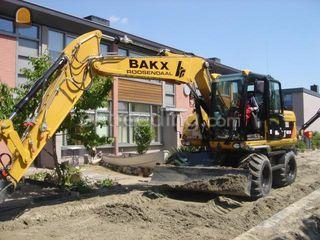 Caterpillar M 313D Omgeving Roosendaal