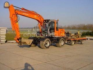 Hitachi ZX130W Omgeving Druten