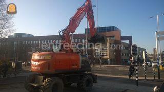 Hitachi ZX140W Omgeving Wijk bij Duurstede