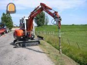 Kubota met grond boor