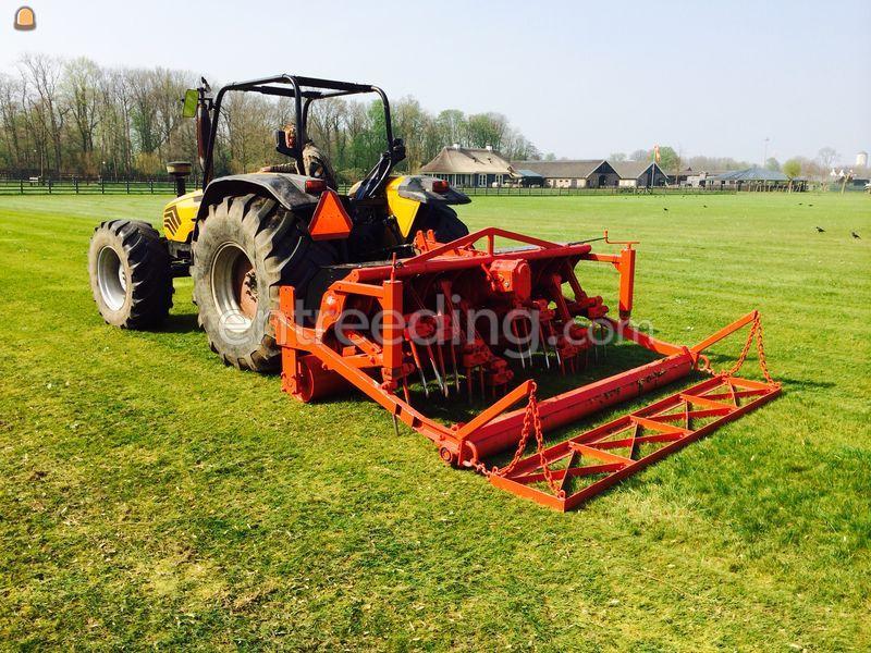 Tractor met beluchtingsmachine incl. sleep