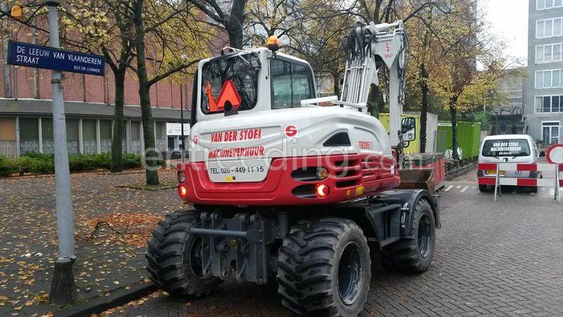 Takeuchi TB295W & DKS en overdruk