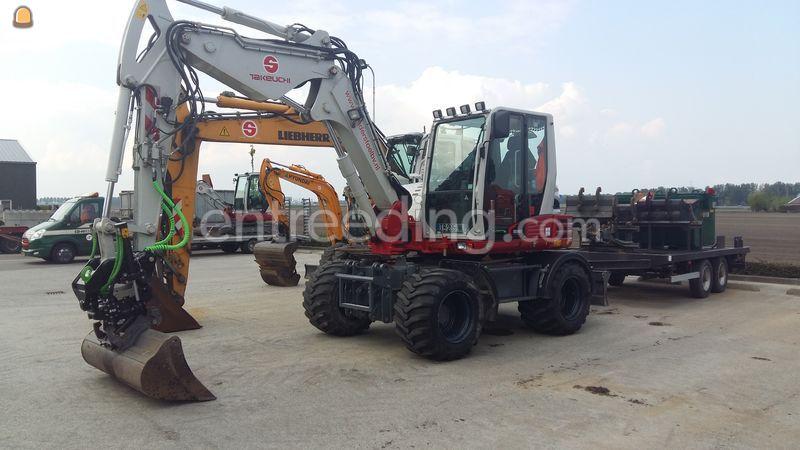 Takeuchi TB295W & DKS en overdruk