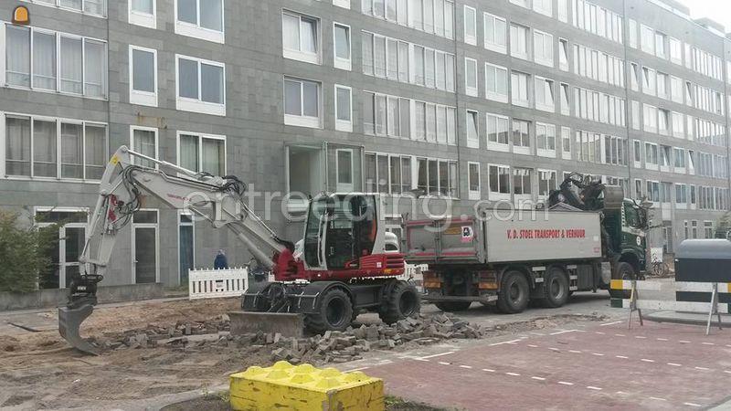 Takeuchi TB295W & DKS en overdruk