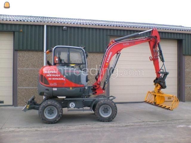 Neuson 6503 WD 6 ton met maaikorfbak