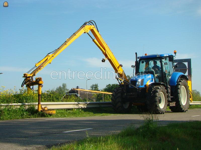 Herder met vangrailmaaier