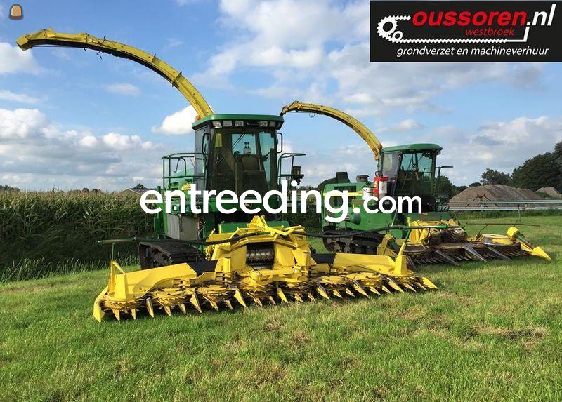 Maishakselen op rupsen John Deere 6750