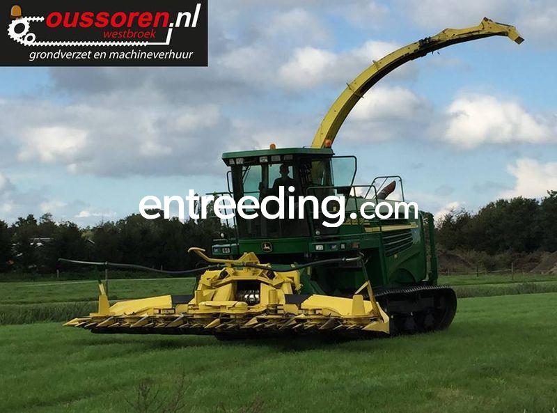 John Deere 7400 Maishakselaar op rupsen