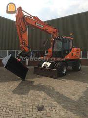 Doosan DX 140W + Draai/Ka... Omgeving Lisse