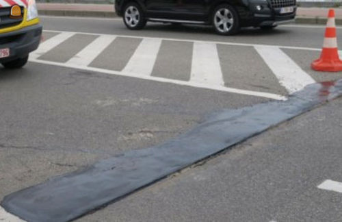 Herstelling wegdekschade ...